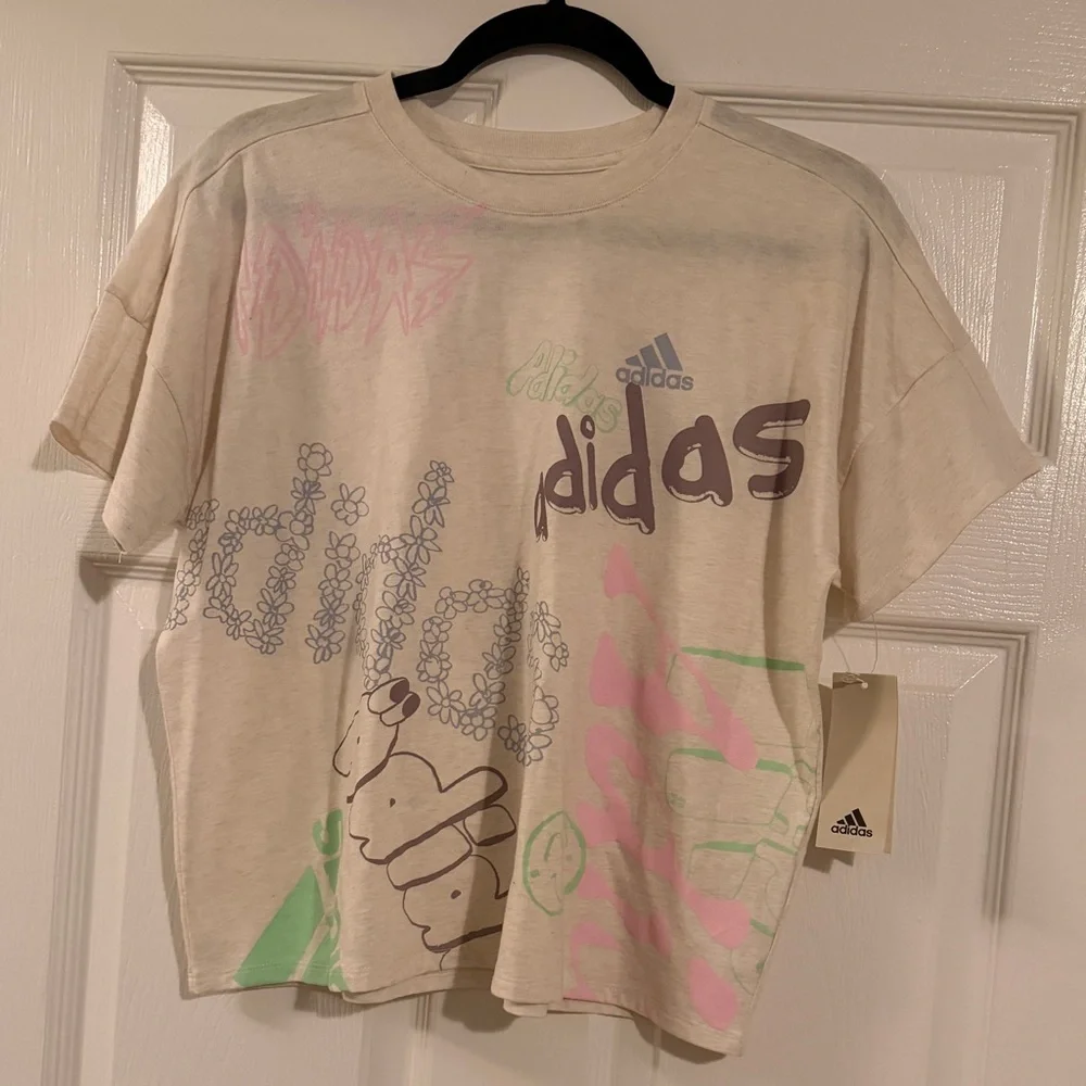 adidas Cream Short-Sleeve Graphic Tee with Pastel Accents